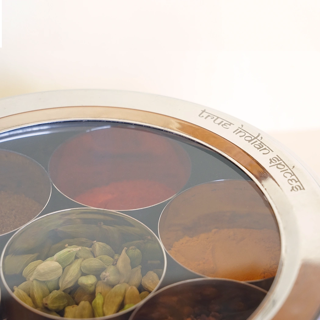 Close-up view of premium quality spices in Indian spice box