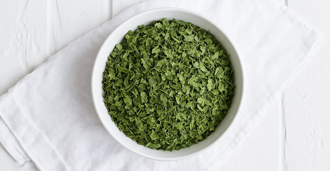 Bowl of Kasoori Methi dried fenugreek leaves, a key ingredient for Indian cooking.