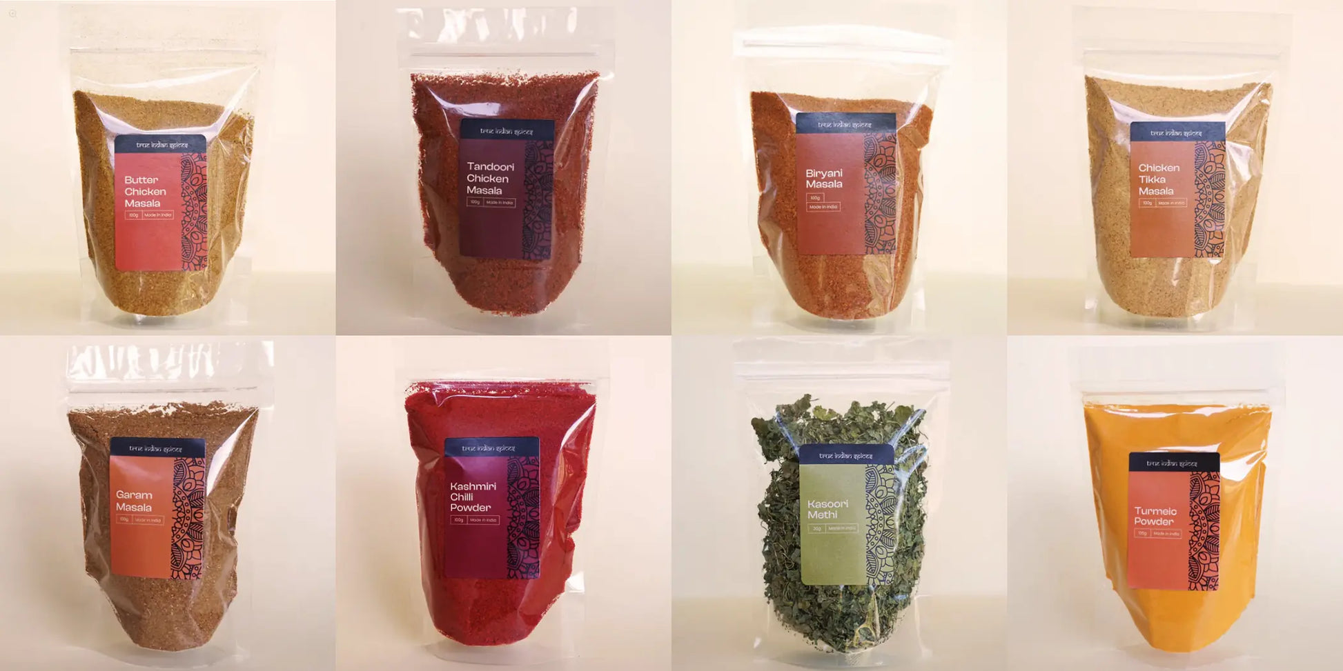 Assorted packages of different coloured spices on a white background
