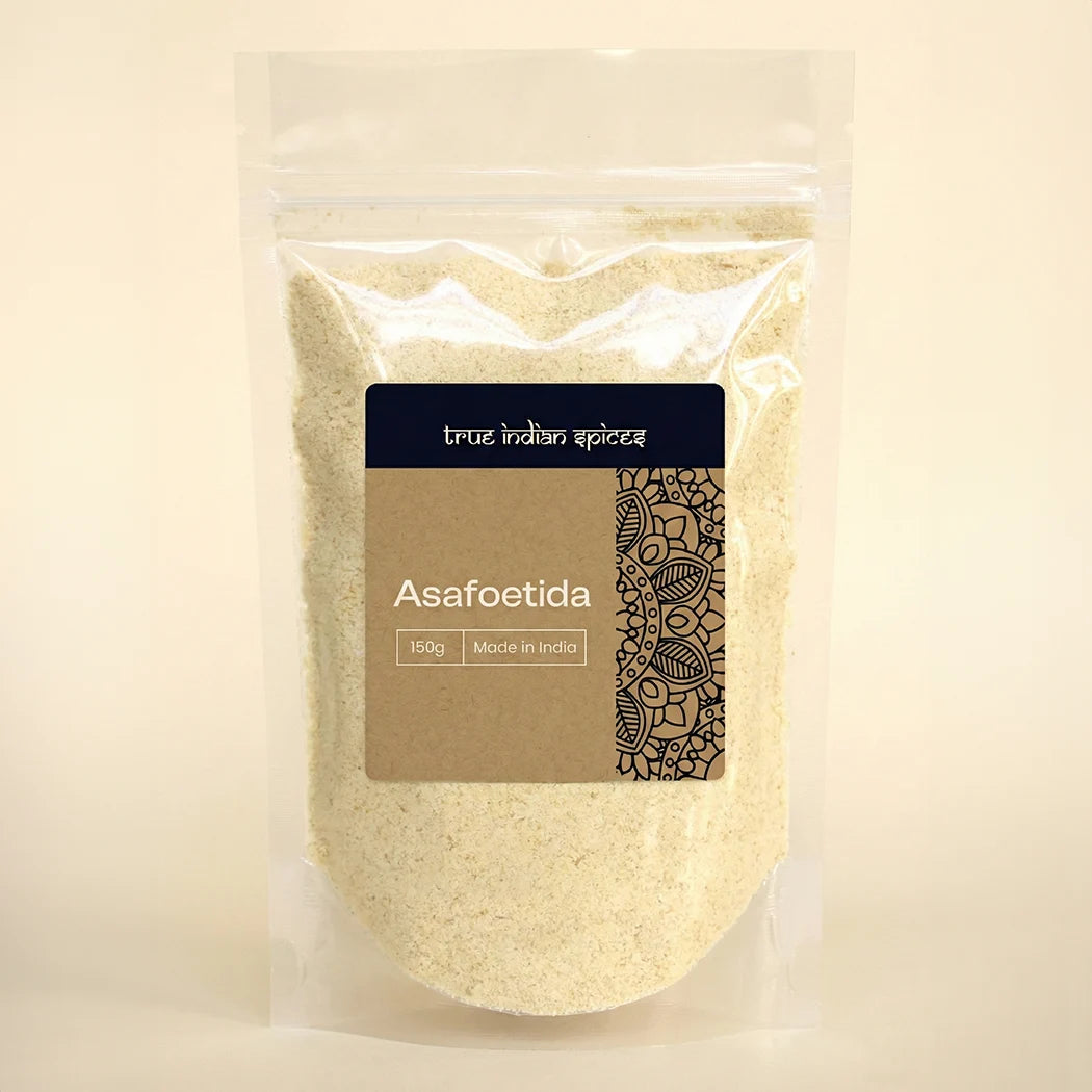 Packaged asafoetida with a visible label on a beige background