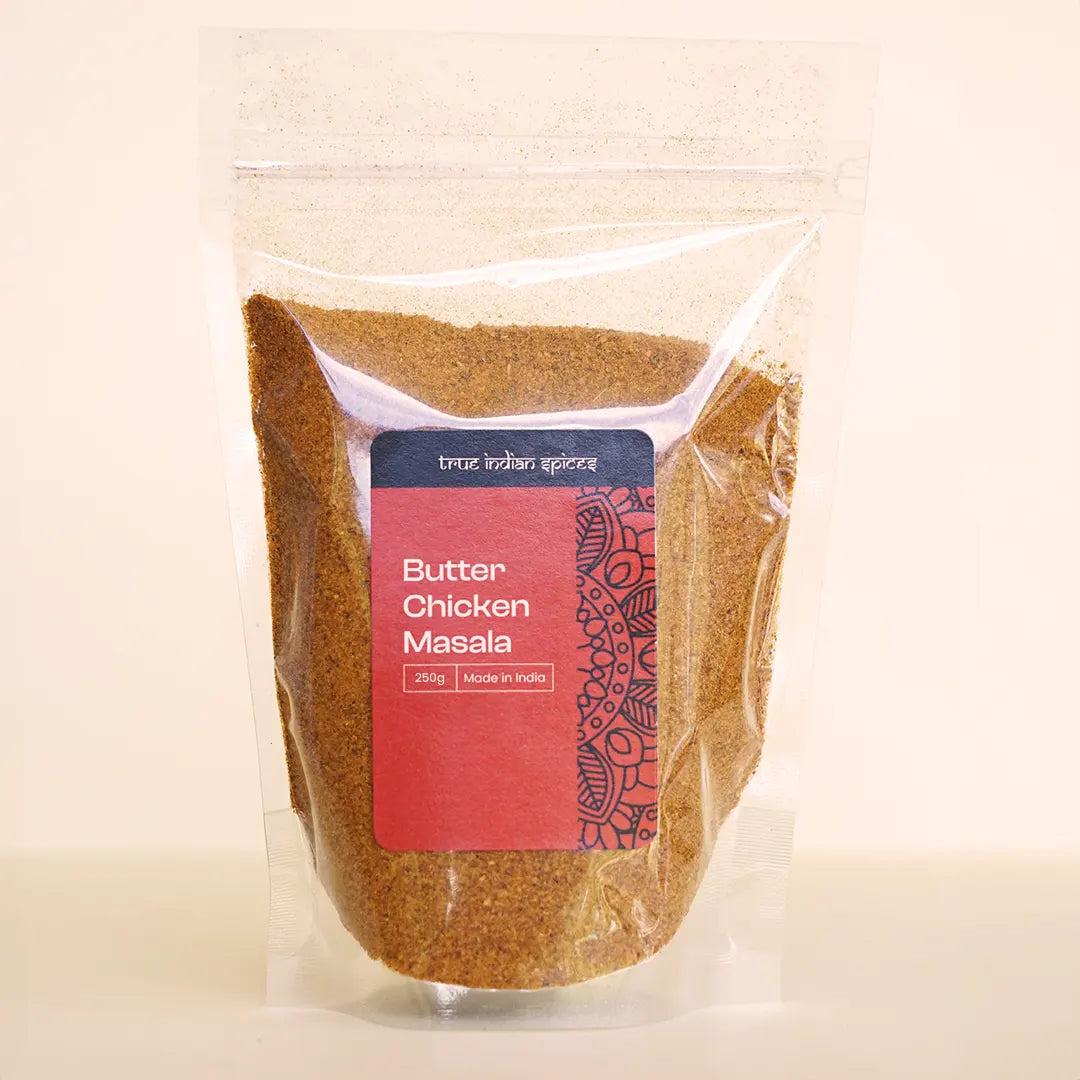 A clear resealable pouch with a label showcasing the 250g butter chicken spice mix.