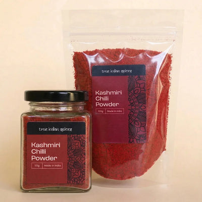 Jar and packaging of Kashmiri Chilli Powder on a beige background