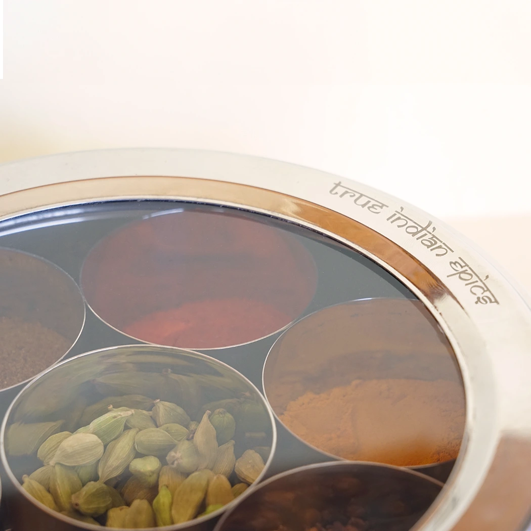 Spice set with 'True Indian Epics' branding on a white background